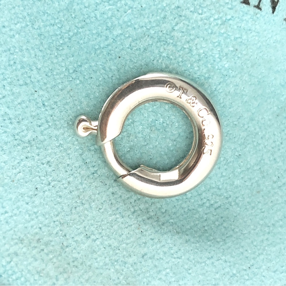 TIFFANY & CO STERLING SILVER 12MM SPRING RING.
